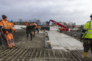 Concreting and smoothing.