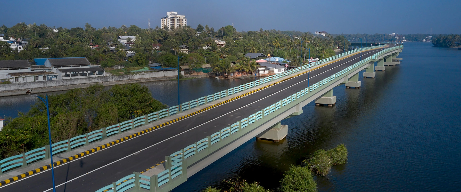 View of the coated Asraman Bridge over Lake Ashtamudi